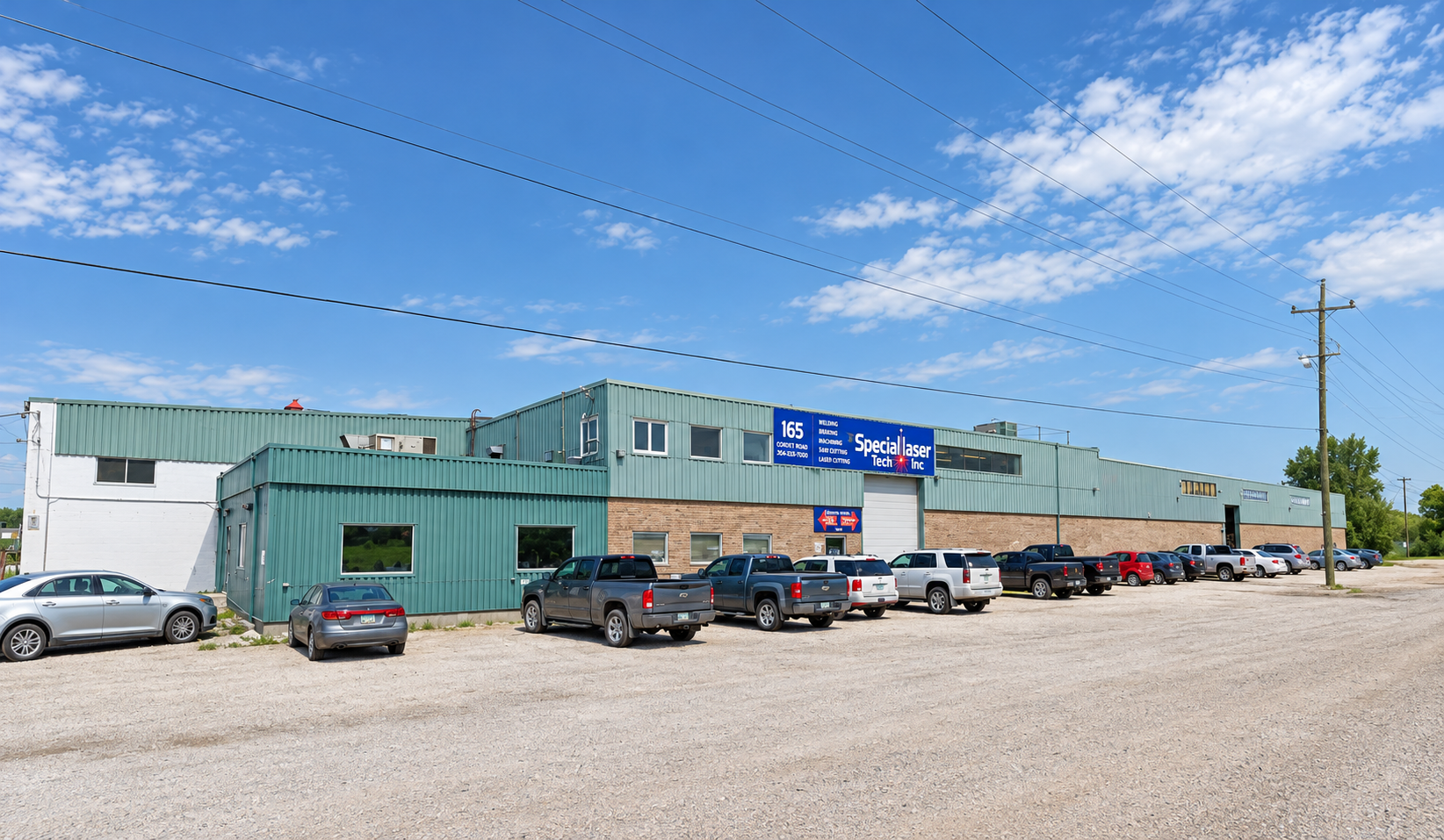 [Describe this photo, e.g. Speciallaser Tech Inc. facility exterior]